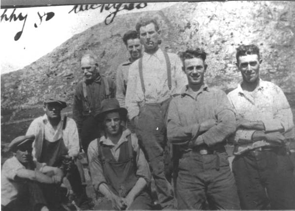 061: l-r standing John Kerrivan, Mike Counsel, Tom Whelan (pipe), Ned Counsel, Jeff Kerrivan; l-r sitting, Lar Barry, Mike Lambe, Jack Carroll. (circa 1934) [courtesy of Mary Anne (Barry) Counsel]  - Mike and Ned sons of Tom Counsel &amp;amp; Mary Cochrane; Tom son of James Whelan &amp;amp; Ellen  Norman; Jack son of William Carroll &amp;amp; Ellen Norman; Mike son of James Lambe &amp;amp; Anne  Whiffin; Jeff son of John Kerrivan &amp;amp; Elizabeth Norman; Lar Barry son of Maurice  Barry &amp;amp; Mary Agnes Lambe.